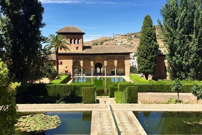 Alhambra, Nasrid Palaces and Generalife Private Tour from Malaga - Generalife gardens and summer palace: water, geometry, and calm