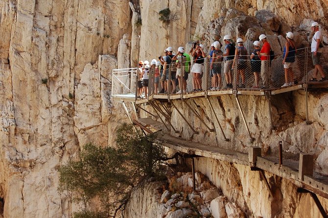 From El Chorro: Caminito del Rey - The Route Reality Check: 7.5 km, Cliffside Narrow Walkways, and Old Railway Bridges