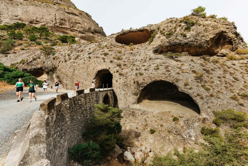 From Málaga & Costa del Sol: Caminito del Rey Guided Tour - Return to the bus: downhill flow and an organized exit