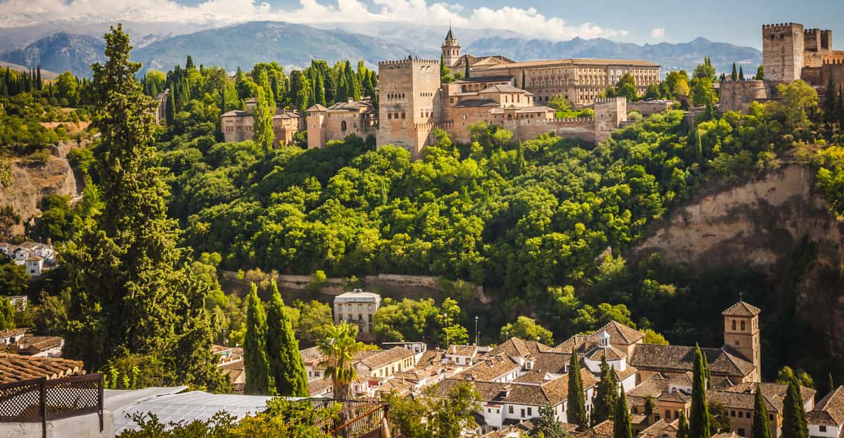 From Malaga: Day Trip to Alhambra by Bus with Entry Tickets - How the Malaga pickup works (and why the exact meeting point matters)