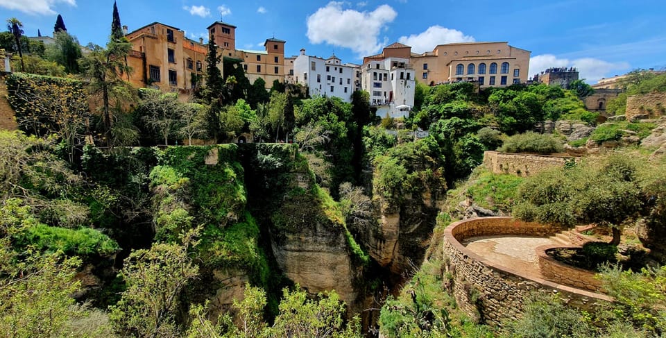 From Malaga: Ronda and Setenil Tour with Scenic Train - Ronda with an English guide: Puente Nuevo, Roman stones, and the bandolero stories