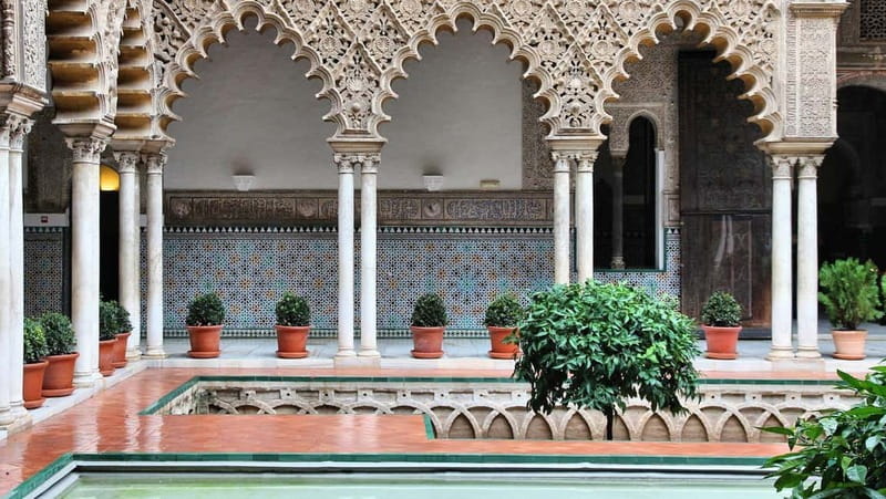 From Malaga: Seville Day Trip with Real Alcázar Tickets - Patio de las Doncellas, Hall of Ambassadors, and the garden walk