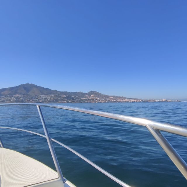 Fuengirola: Fantastic Dolphin Watching Yacht Tour with Drink - Arriving in Puerto de Fuengirola and Boarding the 12-meter Vessel