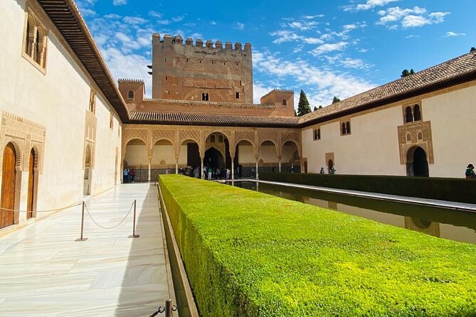 Full-Day Alhambra from Malaga: Choose Your Access & Pick Up Point - Stop by stop: Alcazaba, Generalife, and the Charles V contrast