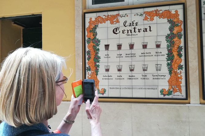 Go local for a day! - Calle Larios and fried almonds in the city’s main artery
