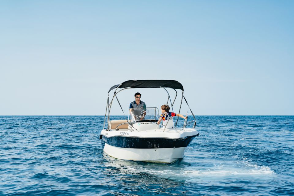 Malaga: Boat Rental without a License for Dolphin Watching - The comfort setup: solarium, padded seats, and a sunshade for long golden hours