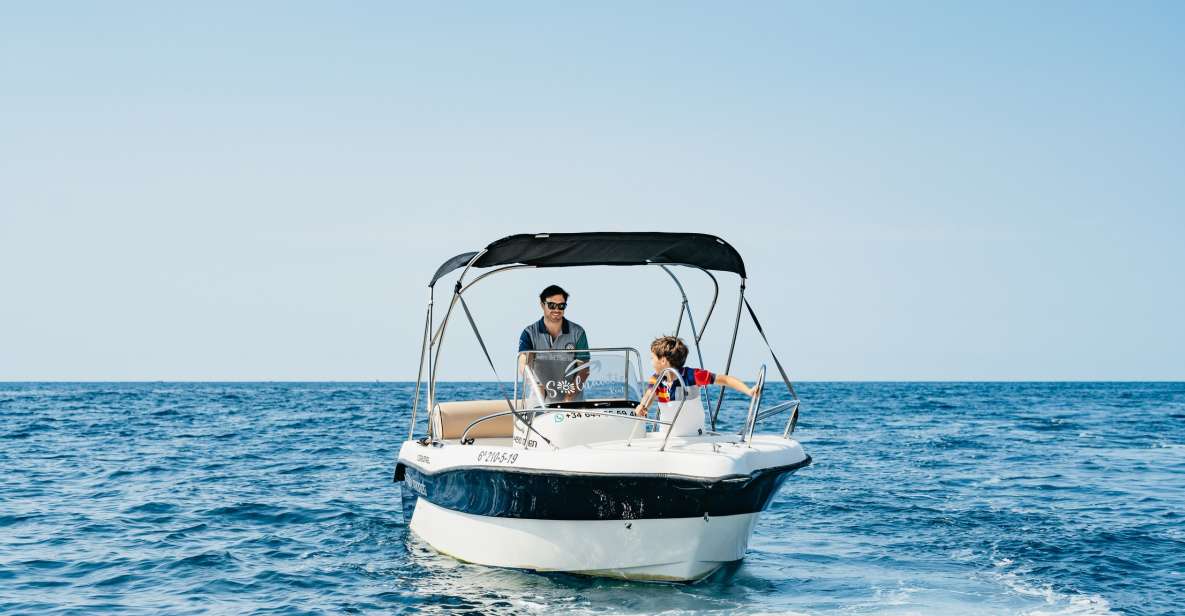Malaga: Boat Rental without a License for Dolphin Watching - On-water highlights: dolphins, swim stops, and anchoring in quiet coves