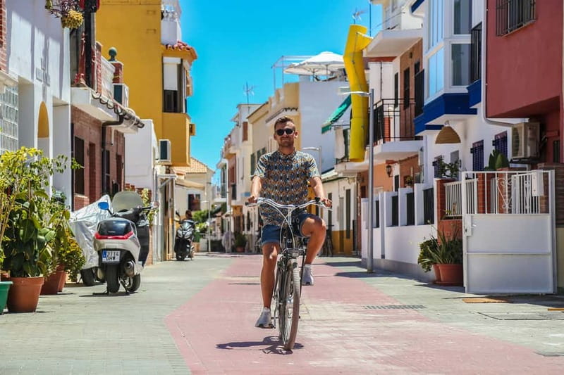 Malaga: Castle Hill and Fisherman Village E-Bike Tour - The Climb to Gibralfaro: Fortress Views Without the Punishment