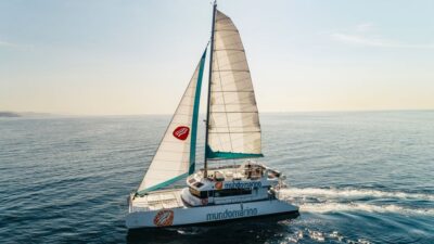 Malaga: Catamaran Sailing Cruise with Swimming & Optional DJ - Getting On Board Mundo Marino: Nets, Crowds, and Crew Vibes