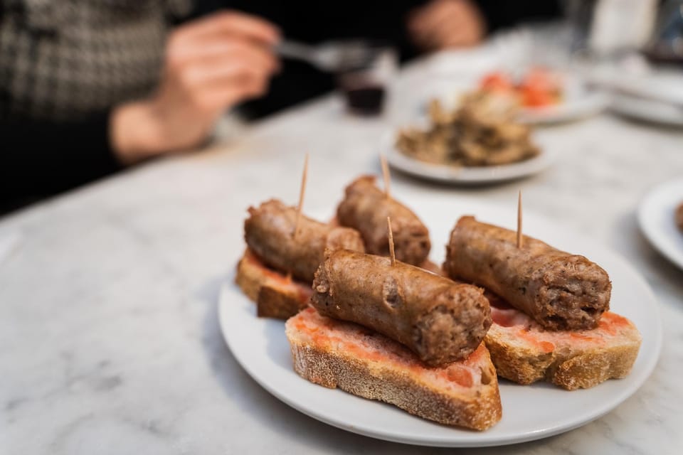 Malaga: Food Tour with Local Guide, Tapas, and Drinks - Tapas, wine, and stories on a 3.5-hour walk