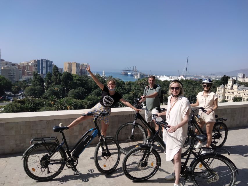 Malaga: Guided E-Bike Tour - Port highlights: lighthouse, Muelle Uno shopping area, and Palmeral