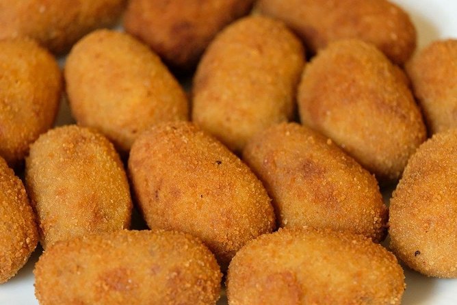 Malaga Market Food Tour: Tapas, Drinks, and Local Flavors - Plaza de la Merced: Roman-era square snacks and Andalusian plates