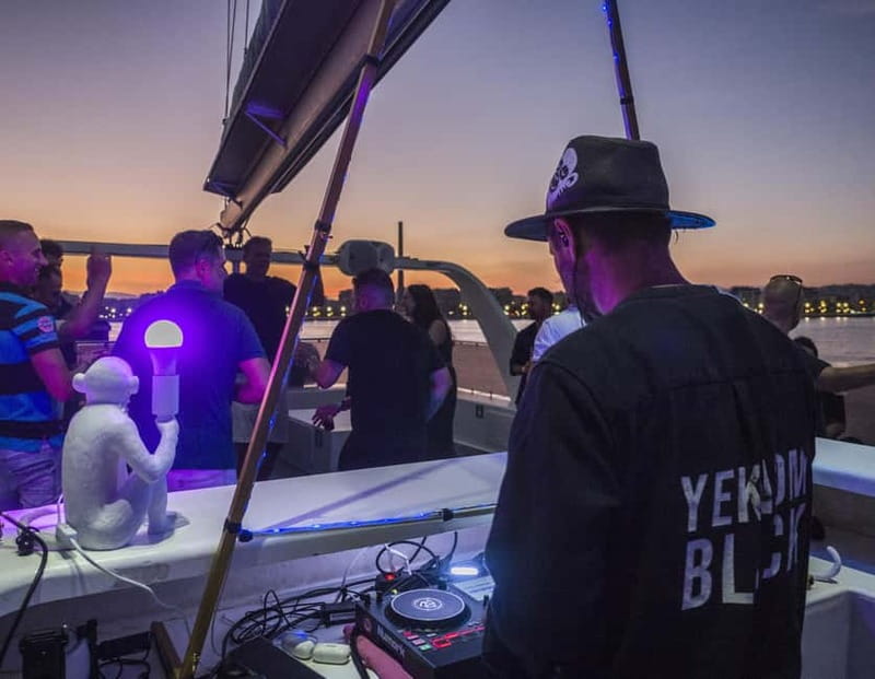 Malaga: Sailing Catamaran Sunset Cruise with Live DJ & Drink - Cava toast and the food reality: plan your expectations