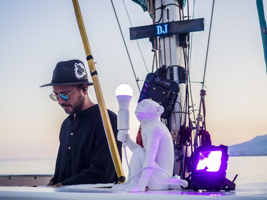 Malaga: Sailing Catamaran Sunset Cruise with Live DJ & Drink - Live DJ on the water: the fun part and the trade-offs