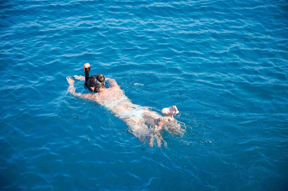 Malaga: Sailing Catamaran with Swimming and Paella Lunch - What’s Extra: Net Seating and the Souvenir Photo