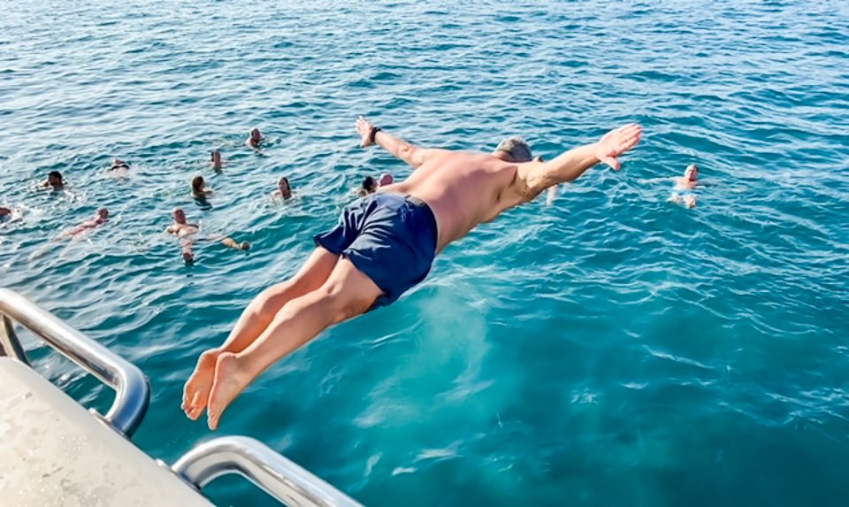 Málaga: Scenic Catamaran Cruise - Nets in the Bow and Shaded Decks: Your Comfort Plan