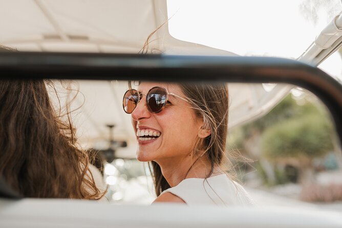 Malaga Welcome Tour with Local Guide in Eco Tuk Tuk Private - La Farola lighthouse: the port entrance story you’ll remember