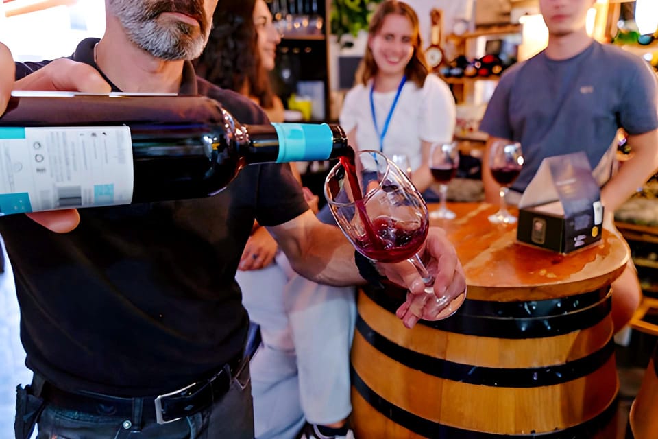 Malaga: Wine and Tapas Tour with Tastings and Drinks - Stop 1: Traditional tapas bar with first tastings and a short walk