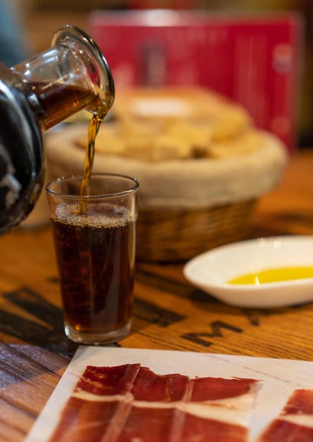Málaga: Wine & Tapas Tour - First Food Stops: Traditional Bites, Iberian Ham, and Market Energy