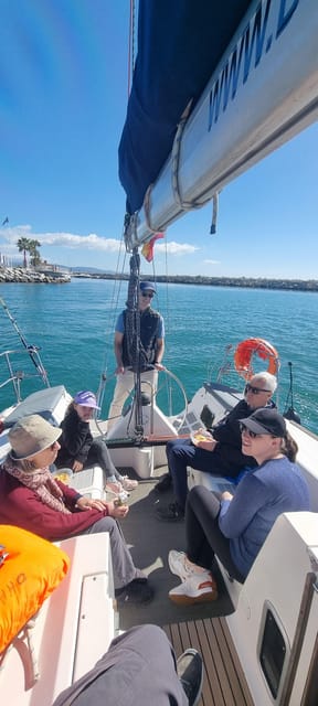 Marbella: Dolphin-Watching Sailboat Trip with Drinks, Snacks - Meeting at Port Bajadilla: The Time Crunch That Matters