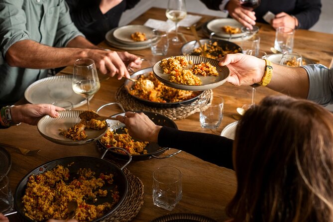 Paella Cooking Class with English Guide in Malaga - What’s included in the meal: sangria, wine, beer, and churros