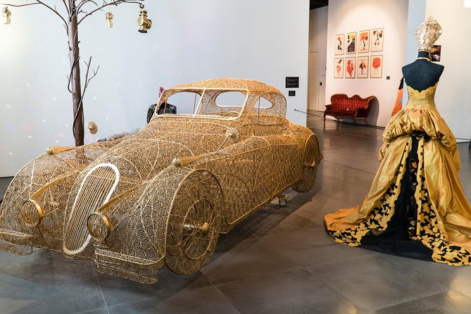 Skip the Line: Malaga Automobile and Fashion Museum Entrance Ticket - Themed fashion collections that give you a 20th-century style timeline