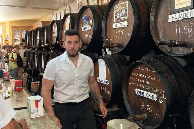 Wine and Tapas walking Tour in Malaga - Stop 2: a local bar built for hearty eating and easy conversation